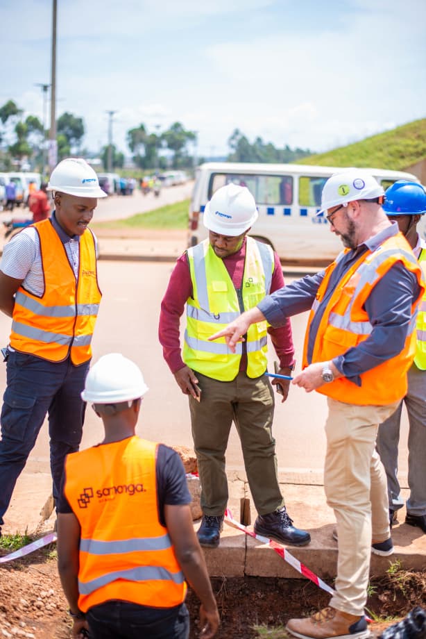 Samanga engineers reviewing roadside installation works